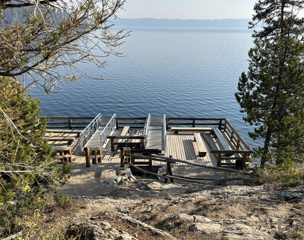 A dock on a lake looks like it is closed.