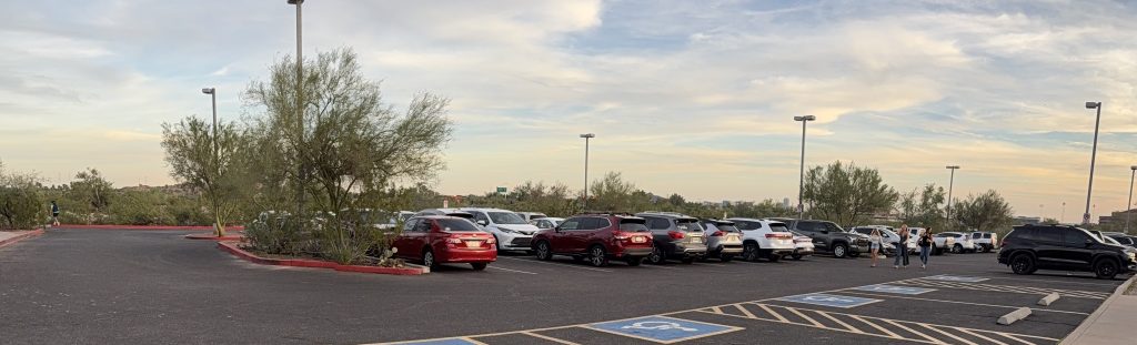 A car parking lot looks full.