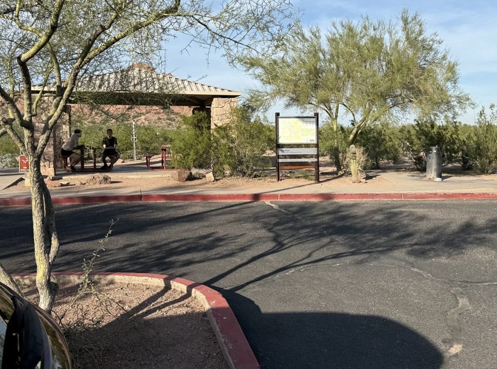 Shadows are long in a view of the trailhead finish.
