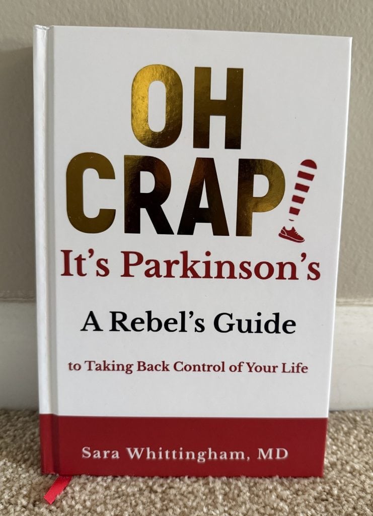A book with shiny letters stating "Oh Crap!"