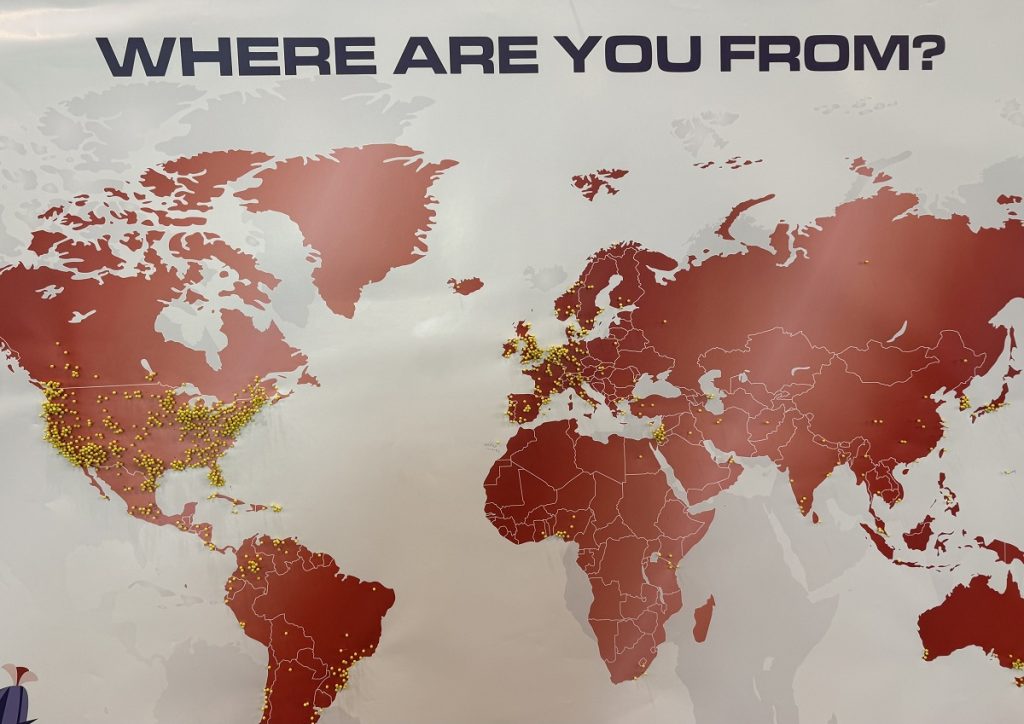 A map of the world with yellow pins stuck in some countries.