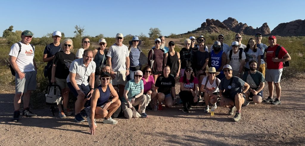 A group of hikers pause for a photo before heading off.